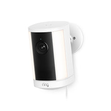 Ring Spotlight Camera Plus Plug-in bianca con staffa di montaggio regolabile su sfondo neutro