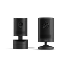 Nero:Outdoor Camera 2K accanto a Pan-Tilt Indoor Cam 2K su sfondo bianco